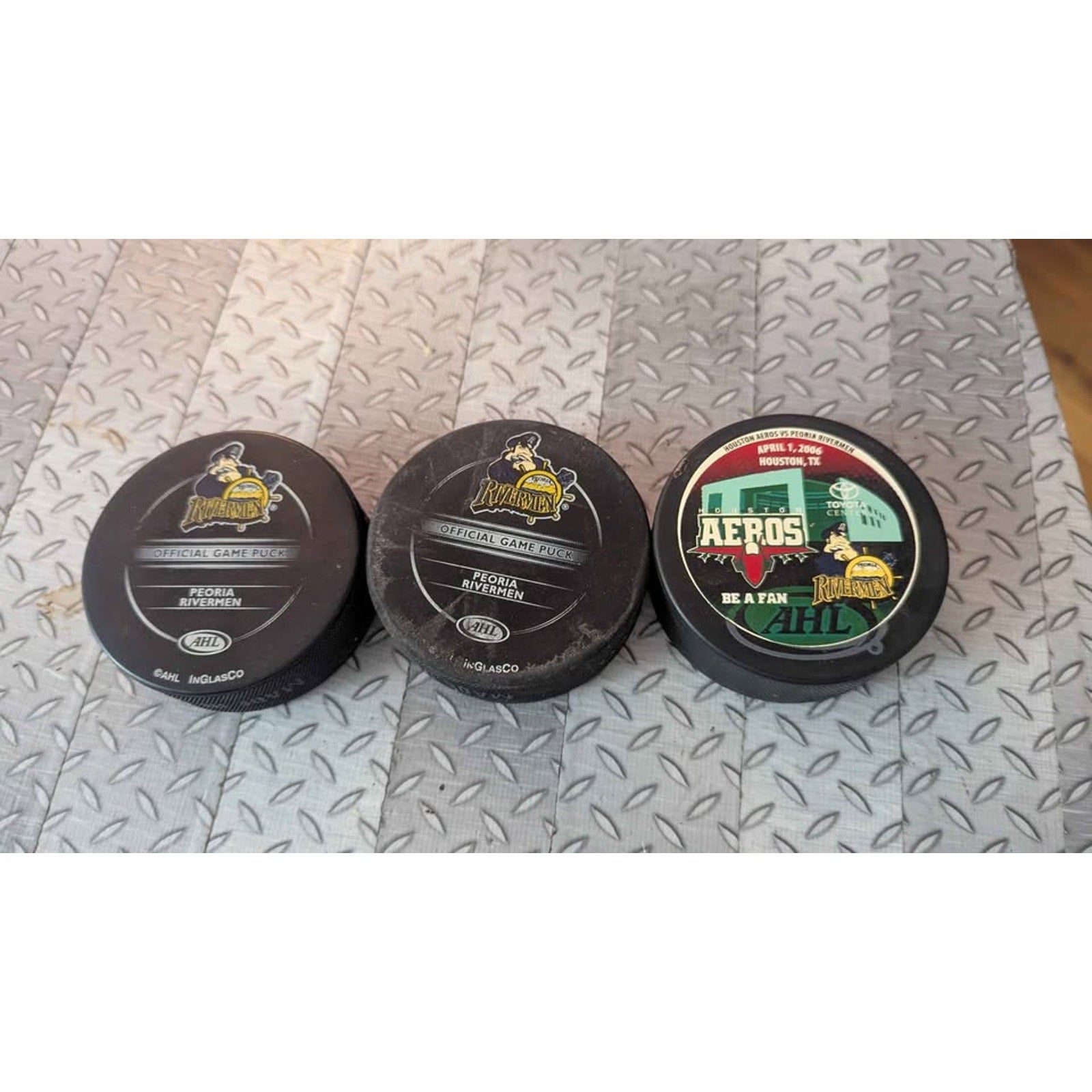 Vintage Peoria Rivermen & Houston Aeros AHL Hockey Pucks - Lot of 3