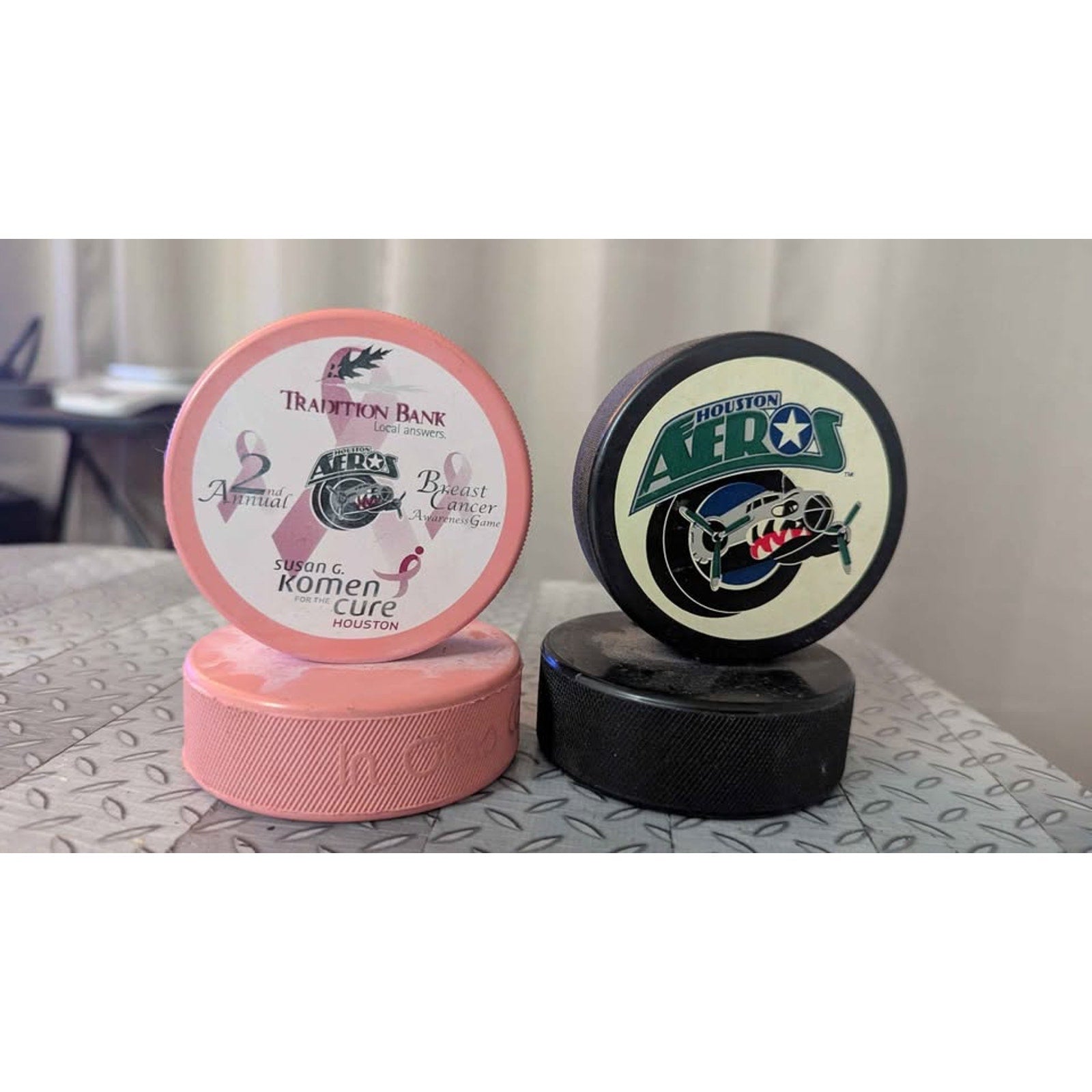 Houston Aeros Hockey Pucks Set (Classic Logo & Rare Pink Charity Puck)