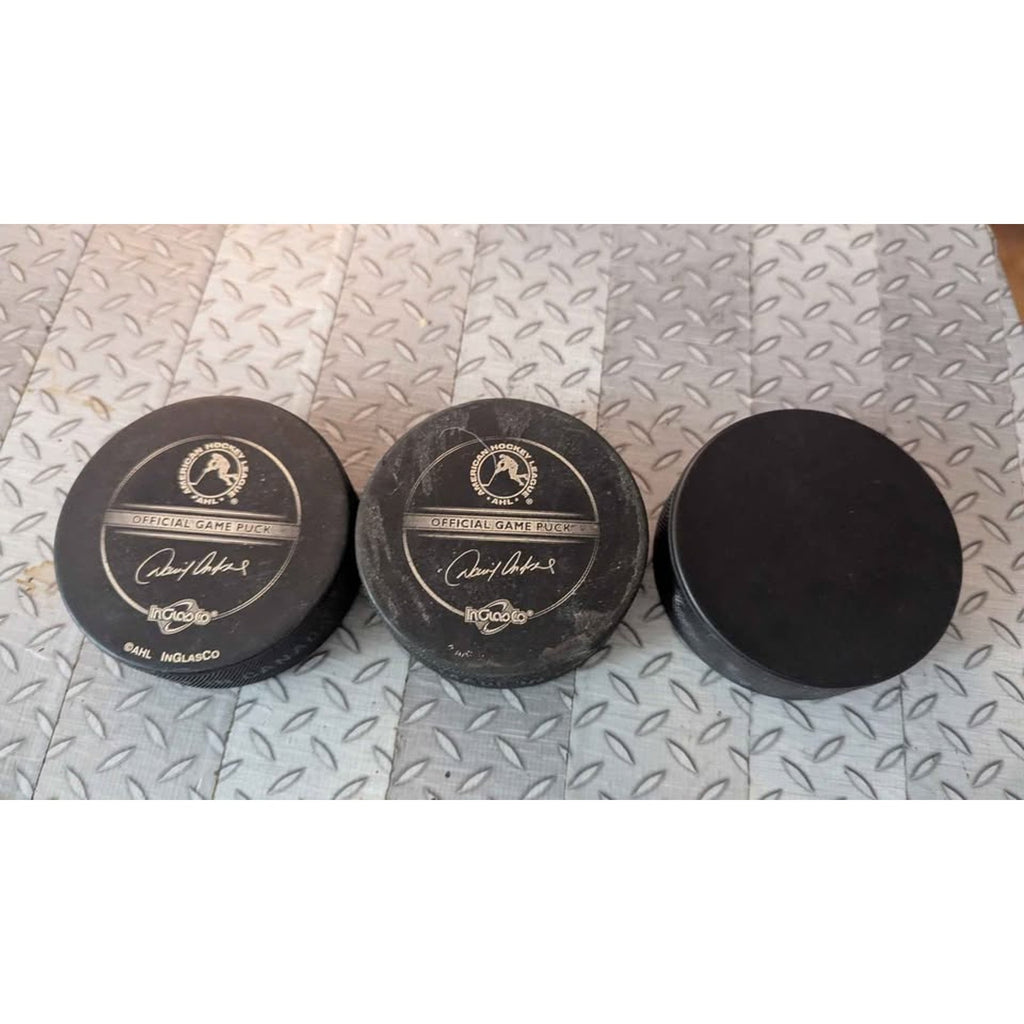 Vintage Peoria Rivermen & Houston Aeros AHL Hockey Pucks - Lot of 3